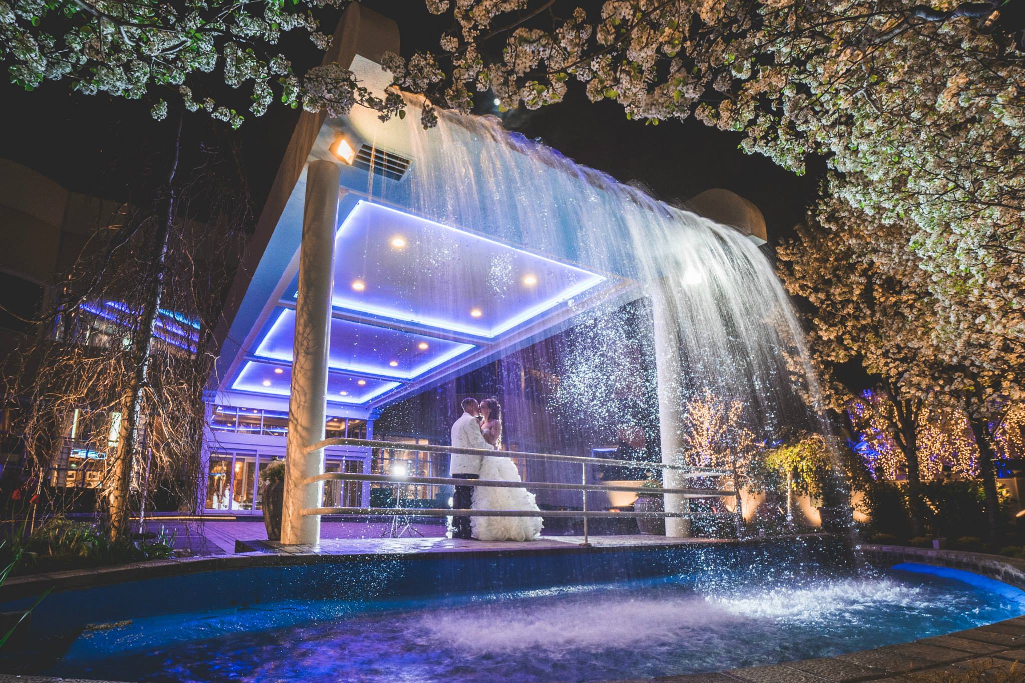 bride and groom outside waterfall chateau briand caterers bride and groom outside waterfall chateau briand caterers